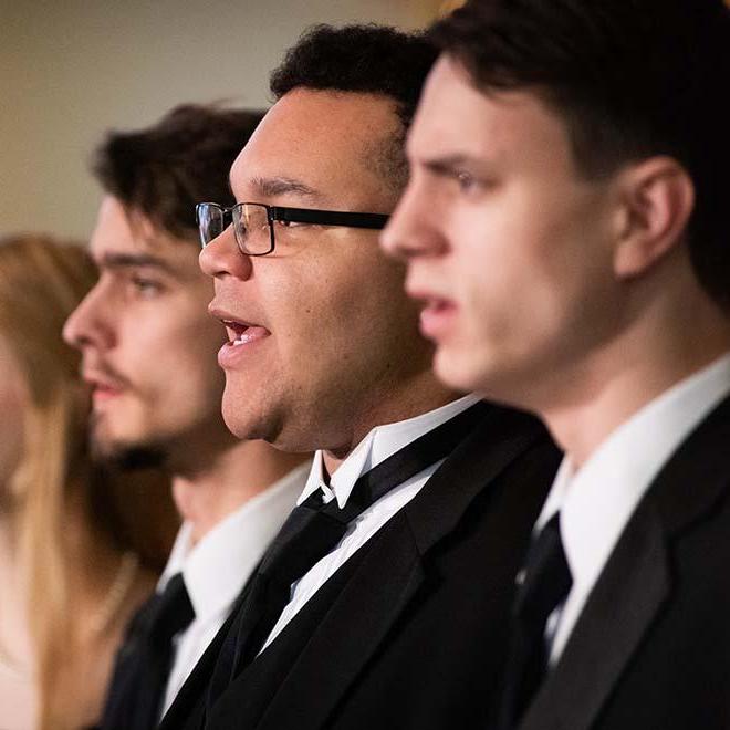 Men’s choir performing